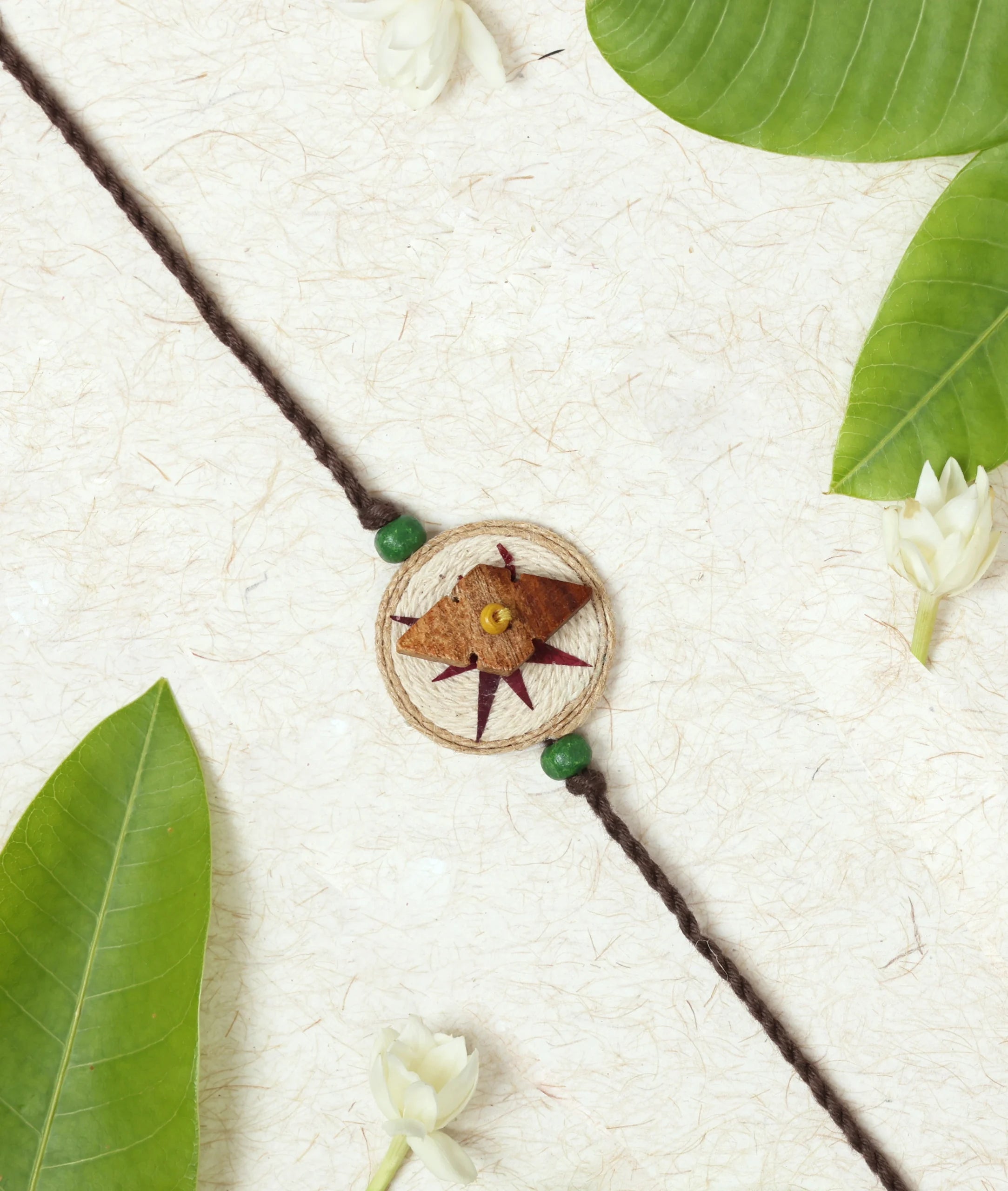 Rakhi | Ghumakkad (Compass) Rakhi (Made From Cotton, Jute, Wooden beads & With Pressed Flower Petals) – Handcrafted – Eco Friendly – Nature’s Soul - Single Piece