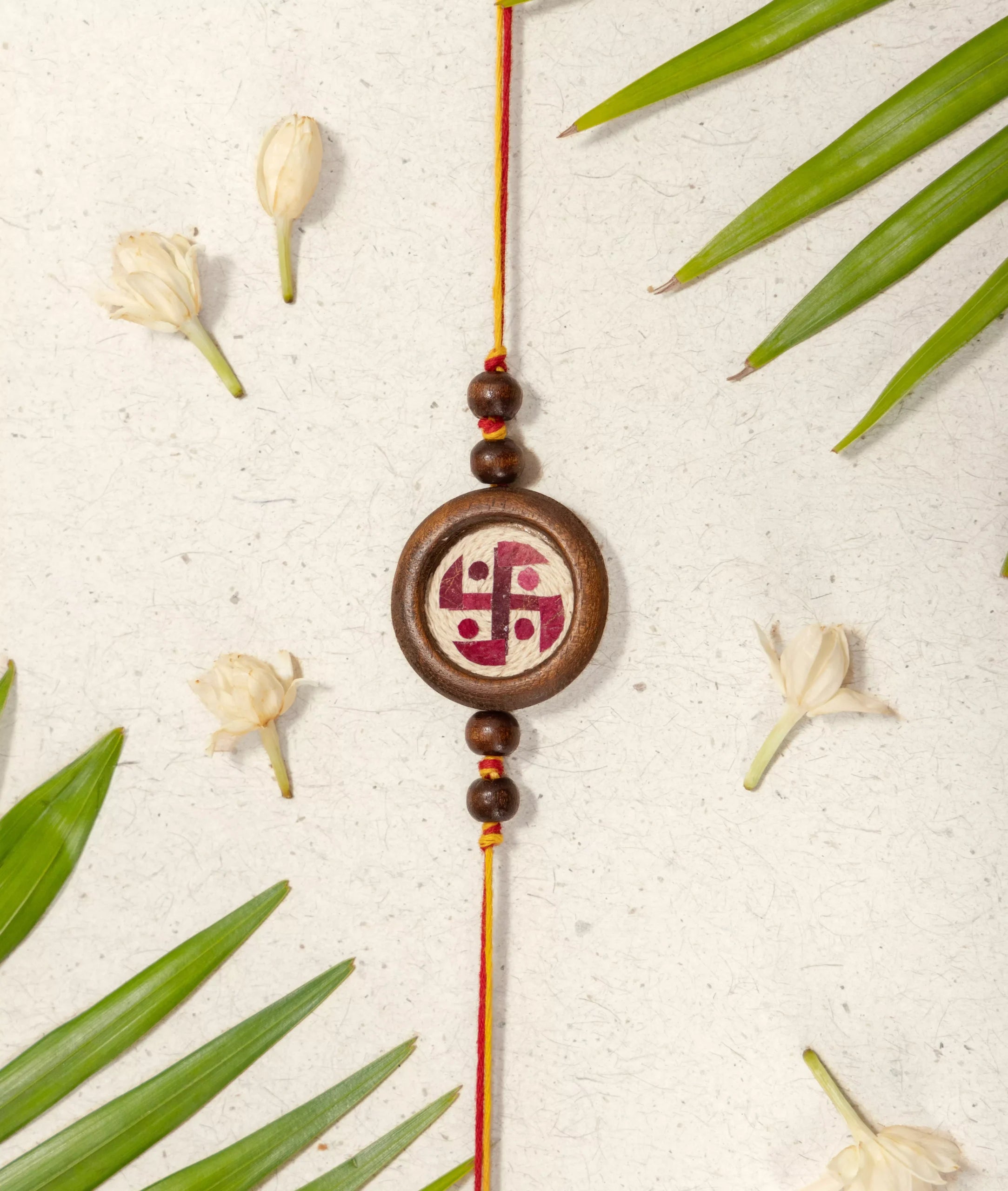 Rakhi | Swastik Rakhi (Made From Cotton, Jute, Wooden beads & With Pressed Flower Petals) – Handcrafted – Eco Friendly – Nature’s Soul