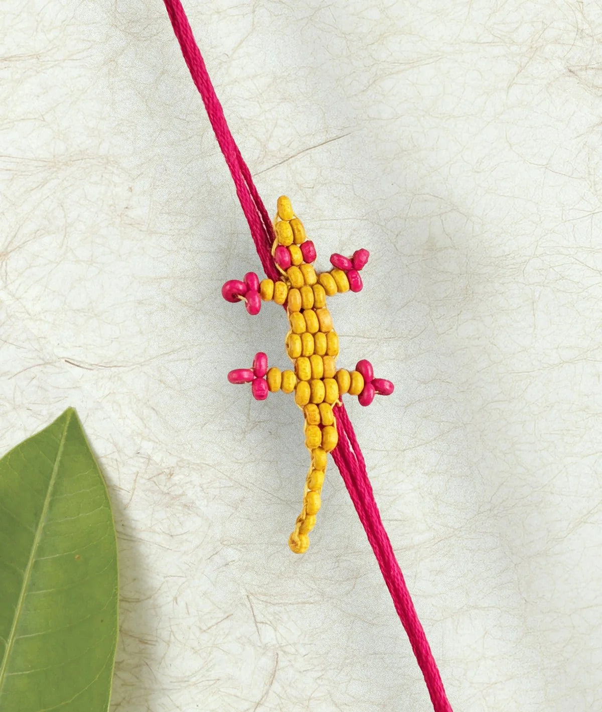 Rakhi | Yellow Chhipkali Rakhi (lizard Rakhi)– Handcrafted – Eco Friendly – Nature’s Soul - Single Piece