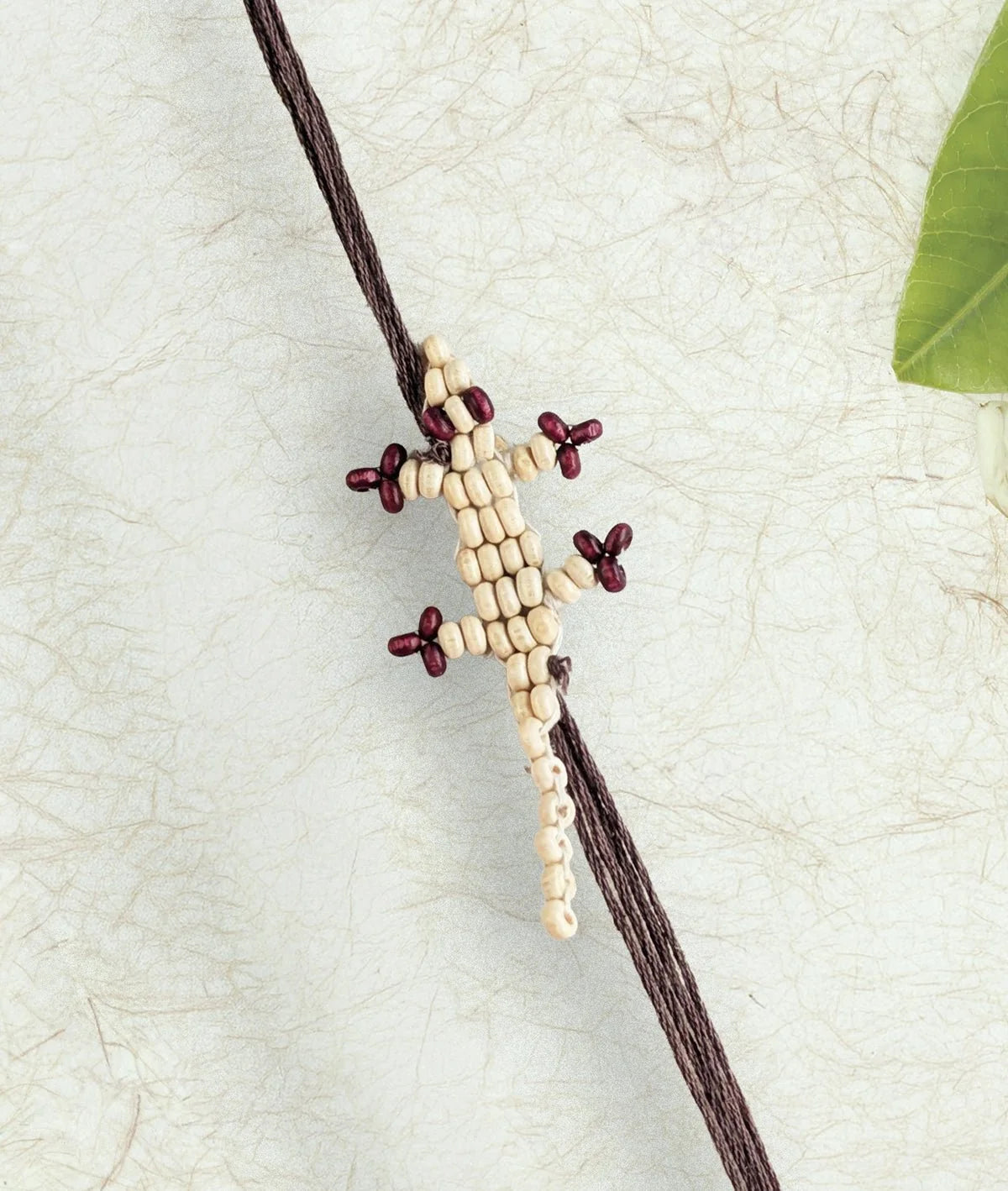 Rakhi | White Chhipkali Rakhi (lizard Rakhi)– Handcrafted – Eco Friendly – Nature’s Soul - Single Piece
