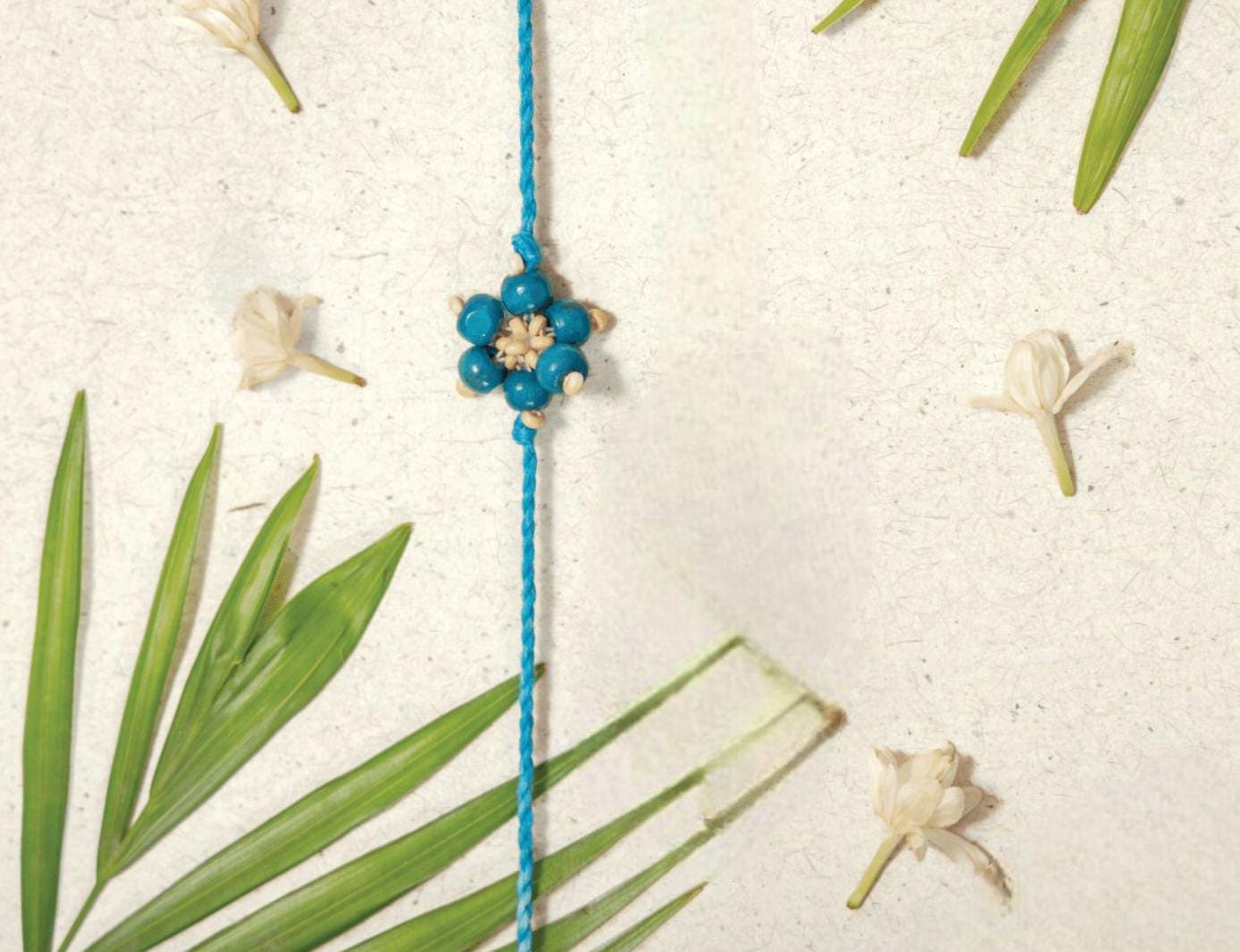 Rakhi | Neel Phool Rakhi (Made From Cotton, Jute, Wooden beads &amp; With Pressed Flower Petals) – Handcrafted – Eco Friendly – Nature’s Soul - Single Piece