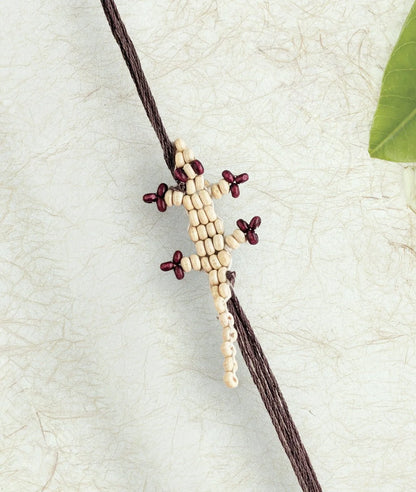 Rakhi | White Chhipkali Rakhi (lizard Rakhi)– Handcrafted – Eco Friendly – Nature’s Soul - Single Piece